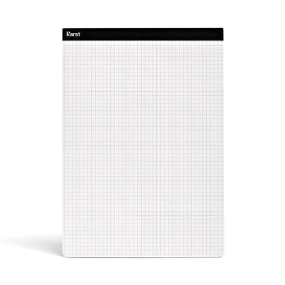 Karst A4 Stone Paper Notepad with grid pages and minimalist design, eco-friendly tear-off pad ideal for planning, note-taking, and technical sketches.