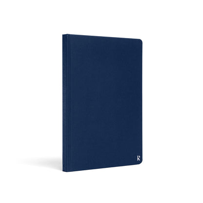 Karst A5 Stone Paper Notebook with navy blue hard cover, eco-friendly waterproof notebook for journaling, note-taking, planning, and daily productivity.