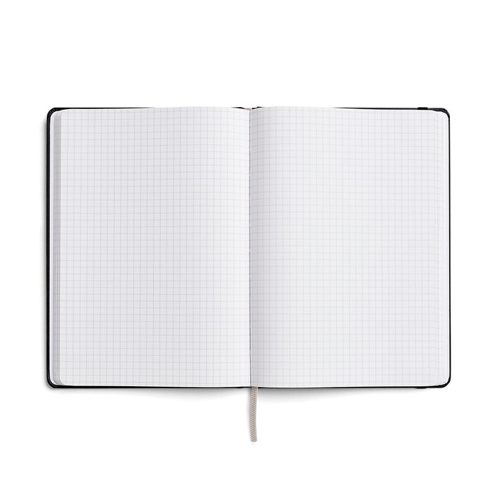 Open Karst A5 Stone Paper Notebook with grid pages, eco-friendly waterproof notebook for journaling, planning, sketching, and everyday note-taking.