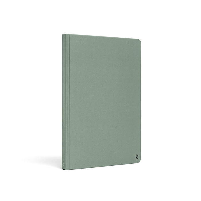 Karst A5 Stone Paper Notebook with eucalyptus green hard cover, eco-friendly waterproof notebook for journaling, note-taking, planning, and everyday productivity.