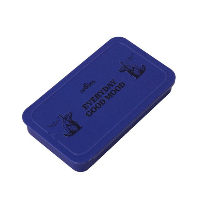 Bright blue Collins Everyday Good Mood incense tin with playful illustrated graphics, compact minimalist storage case for modern home fragrance and incense accessories.